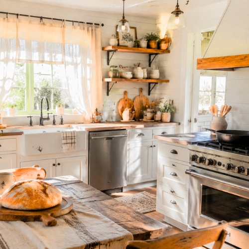 Farmhouse kitchen decorated for fall with mini pumpkins