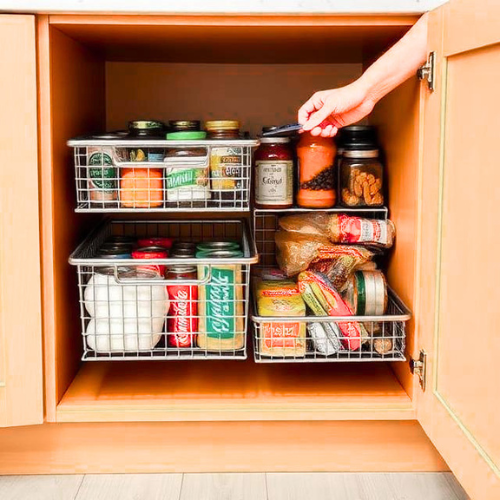 Modern kitchen lower cabinet with pull-out wire baskets and sliding drawer organizers